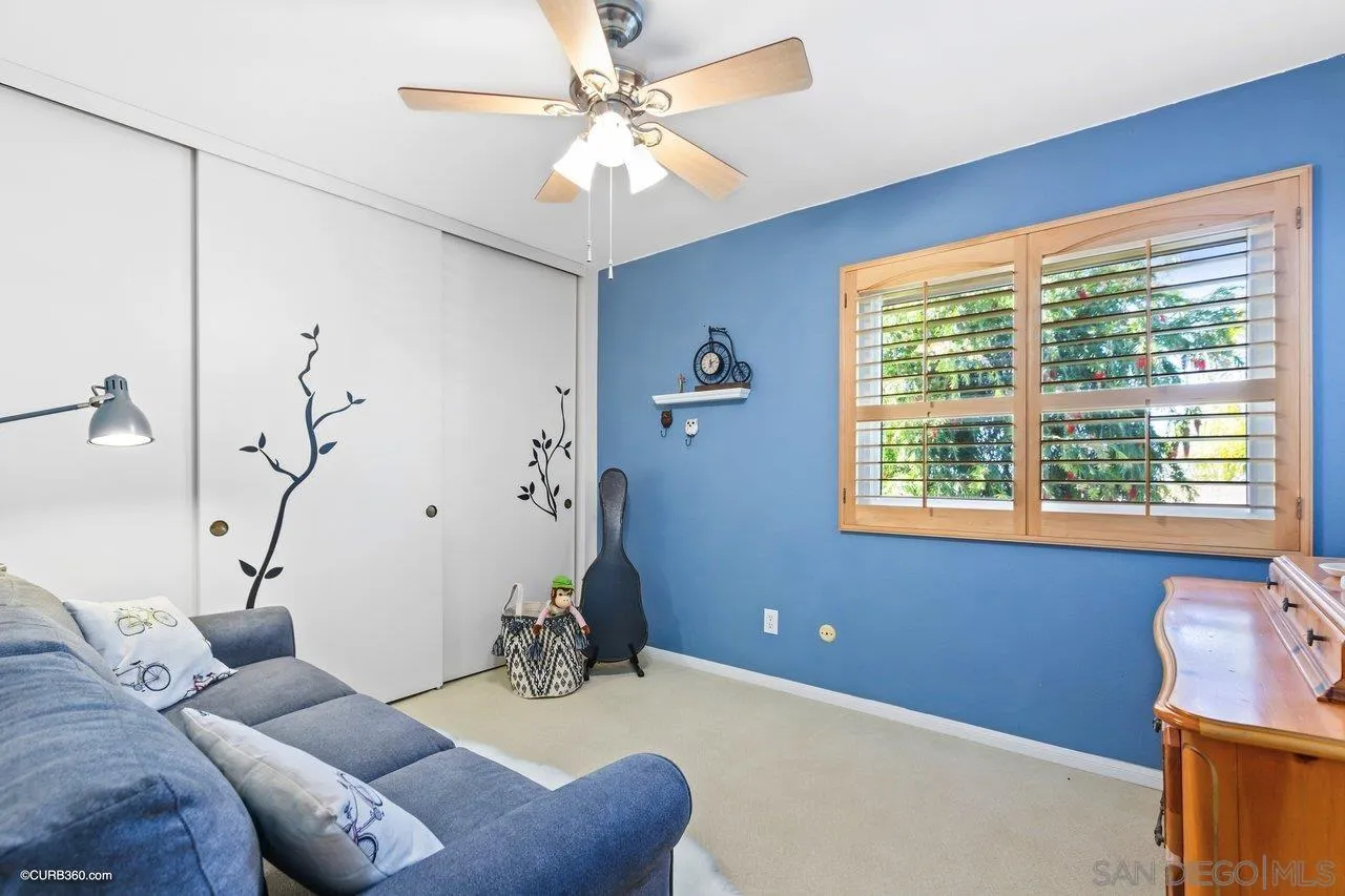 744 Roca Road Chula Vista, CA 91910 - Photo 18 of 24 a living room with furniture and a window