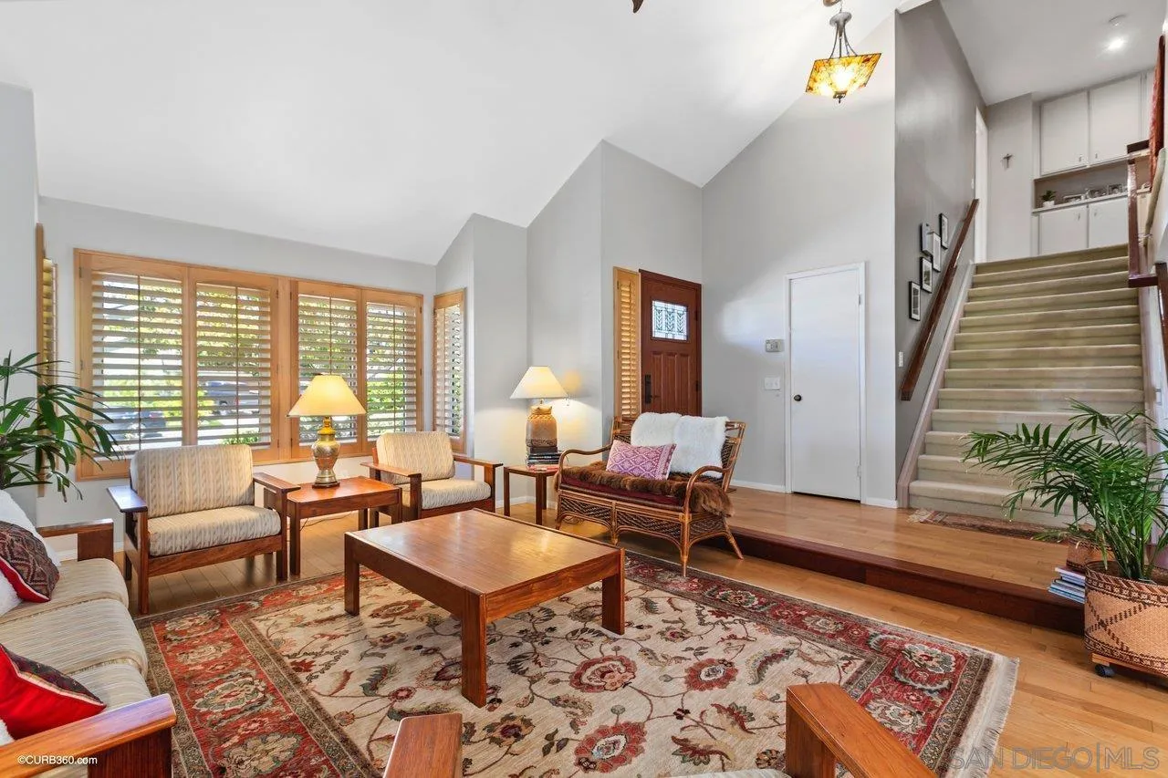 744 Roca Road Chula Vista, CA 91910 - Photo 3 of 24 a living room with furniture and a potted plant