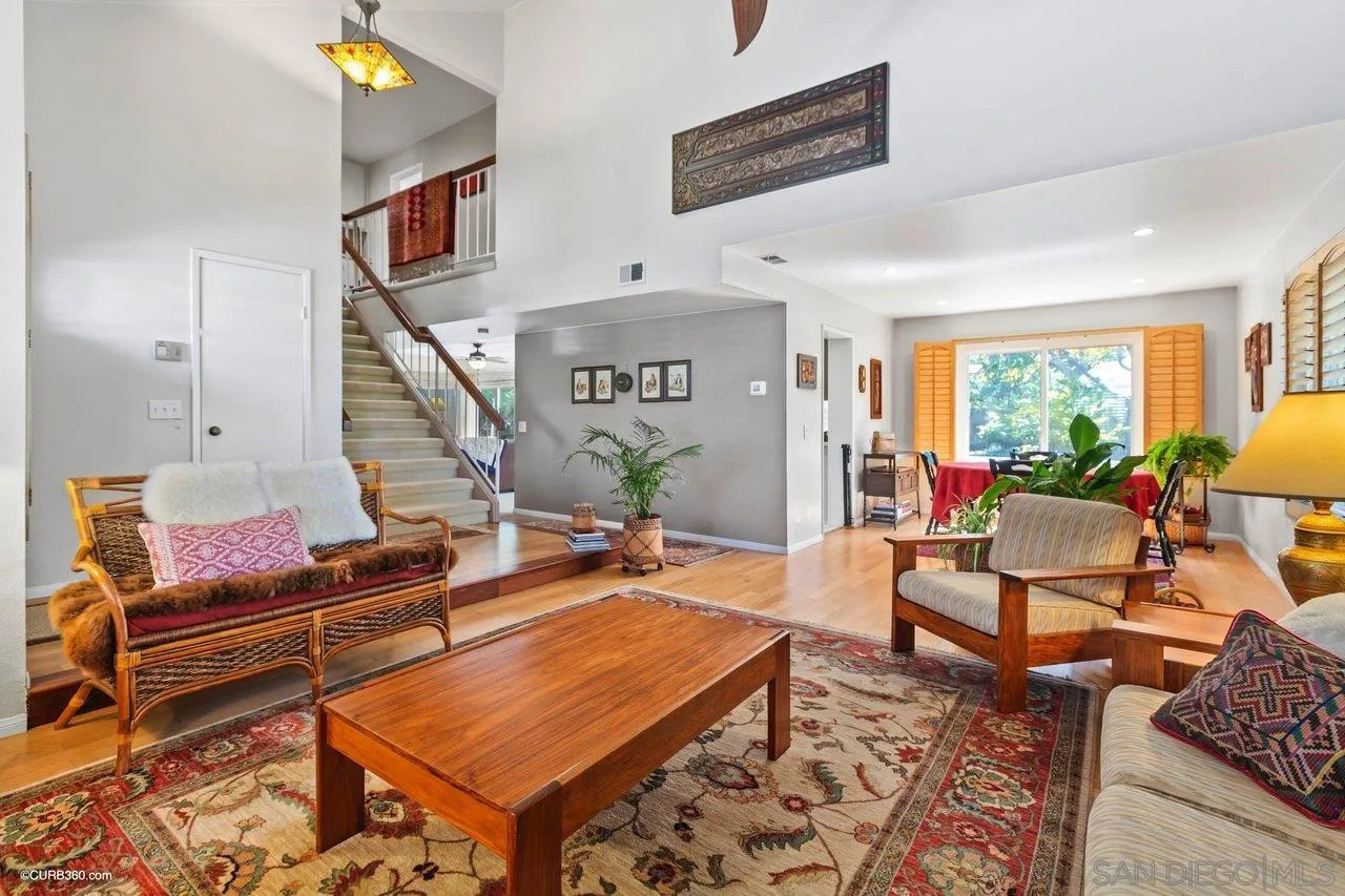 744 Roca Road Chula Vista, CA 91910 - Photo 4 of 24 a living room with furniture a rug and a potted plant