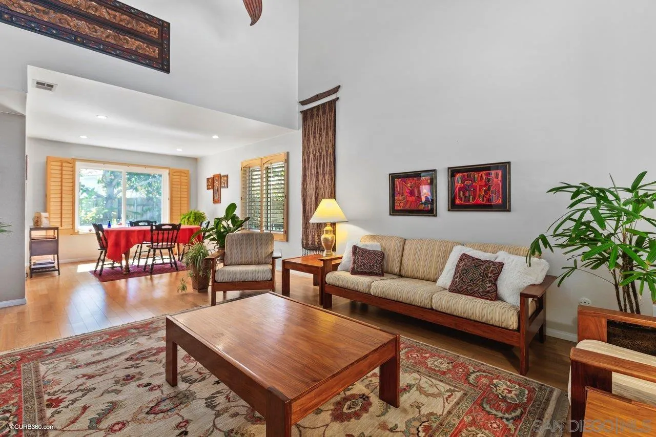 744 Roca Road Chula Vista, CA 91910 - Photo 5 of 24 a living room with furniture and a large window