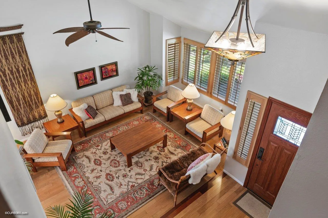744 Roca Road Chula Vista, CA 91910 - Photo 6 of 24 a living room with furniture and a chandelier