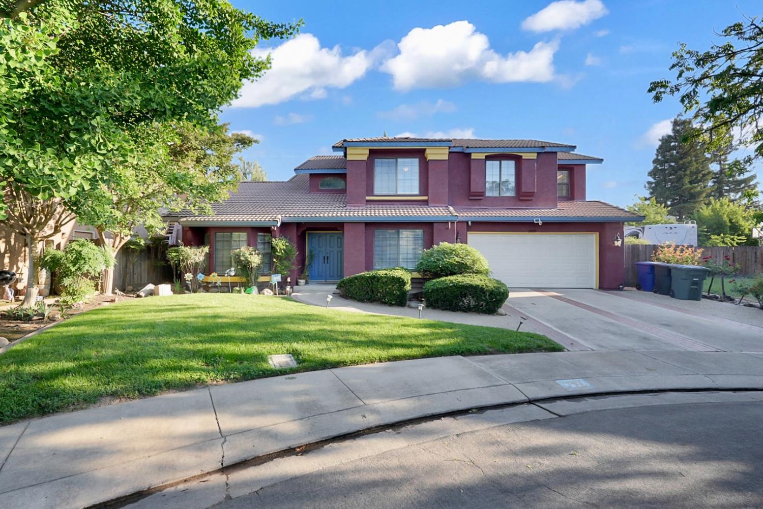 2809 Fleming Court Modesto, CA 95356 - Photo 2 of 34 a front view of a house with a yard and outdoor seating