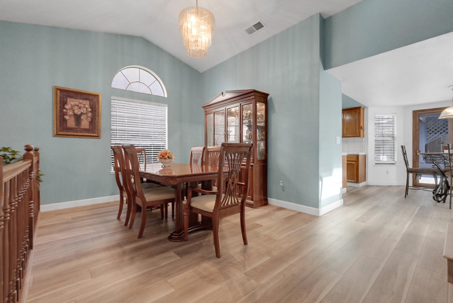 2809 Fleming Court Modesto, CA 95356 - Photo 6 of 34 a view of a dining room with furniture and wooden floor