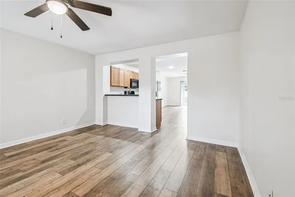 a view of a livingroom with wooden floor