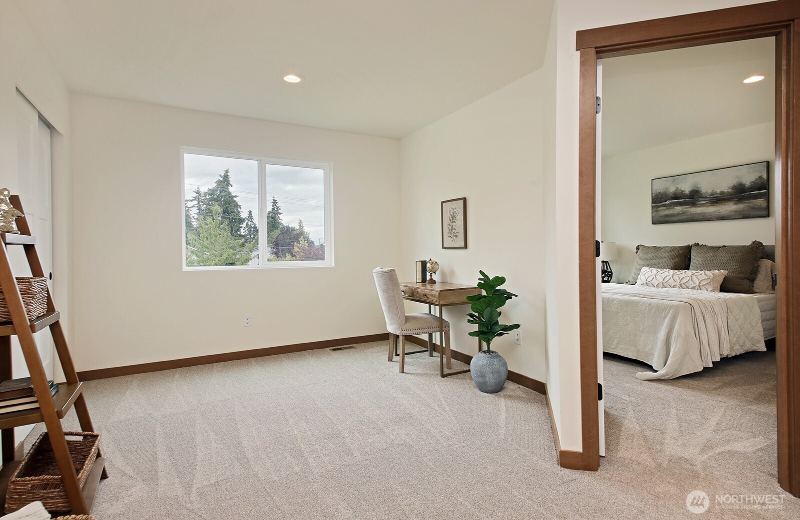 695 3rd Street, Unit B Langley, WA 98260 - Photo 24 of 28 a living room with furniture and a window