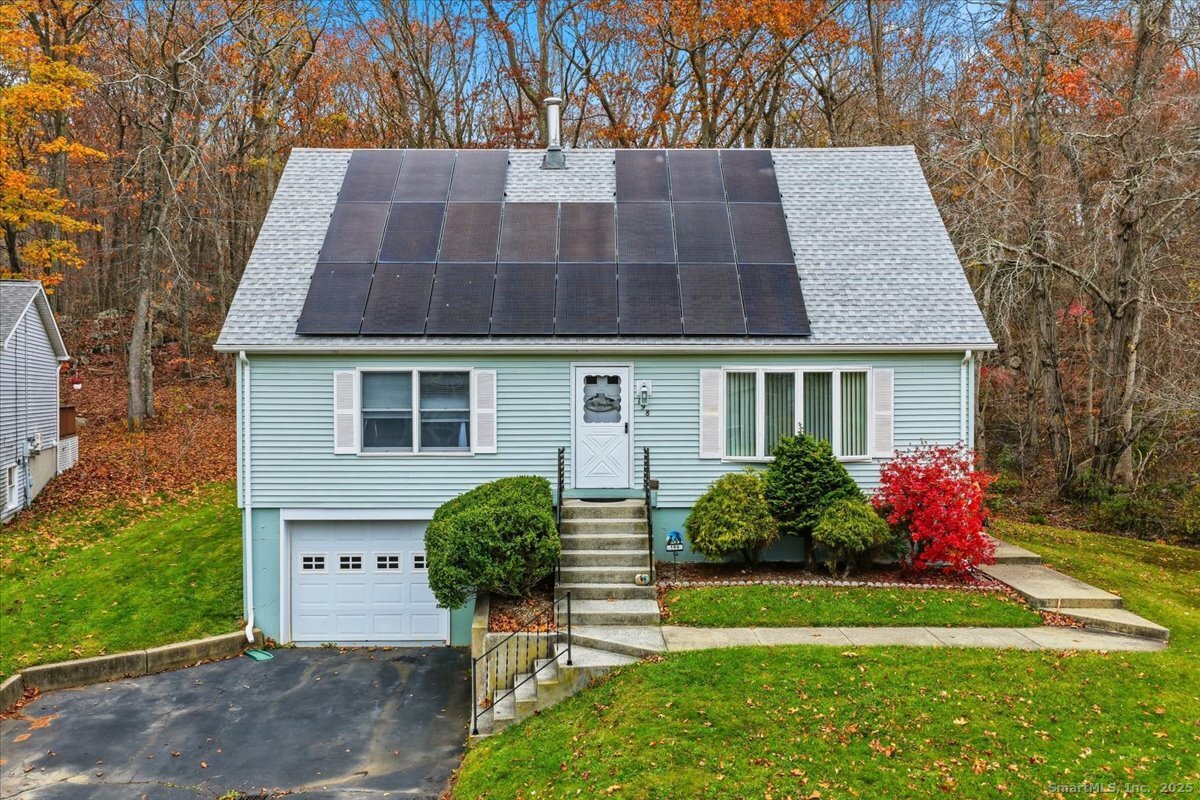 198 Dartmouth Drive Groton, CT 06355 - Photo 1 of 25 a front view of a house with garden