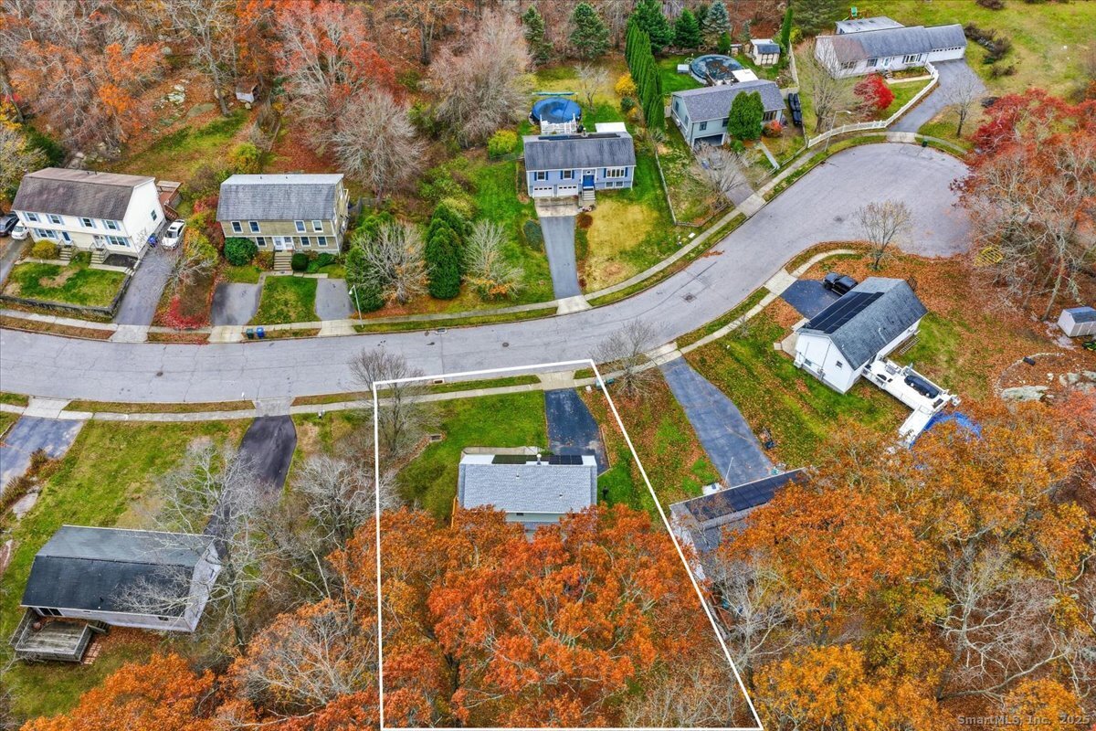 198 Dartmouth Drive Groton, CT 06355 - Photo 25 of 25 an aerial view of a house with a swimming pool