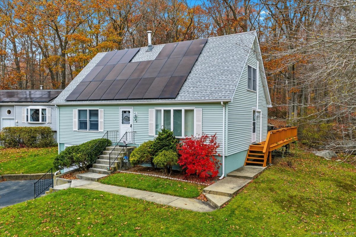 198 Dartmouth Drive Groton, CT 06355 - Photo 3 of 25 front view of a house with a yard
