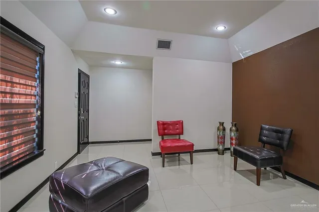 a room with furniture and a window