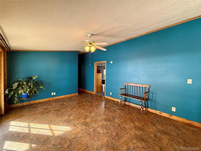 a view of a chairs and table in a room