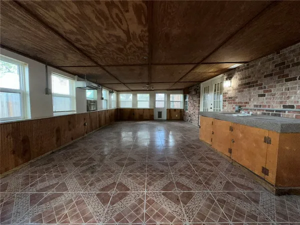 a view of a room with windows