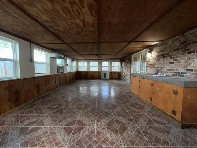 a view of a room with windows