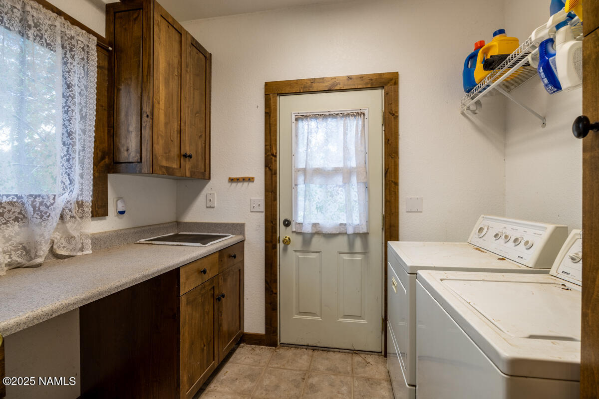 129 North Spitz Spring Road Parks, AZ 86018 - Photo 12 of 59 a utility room with dryer and washer