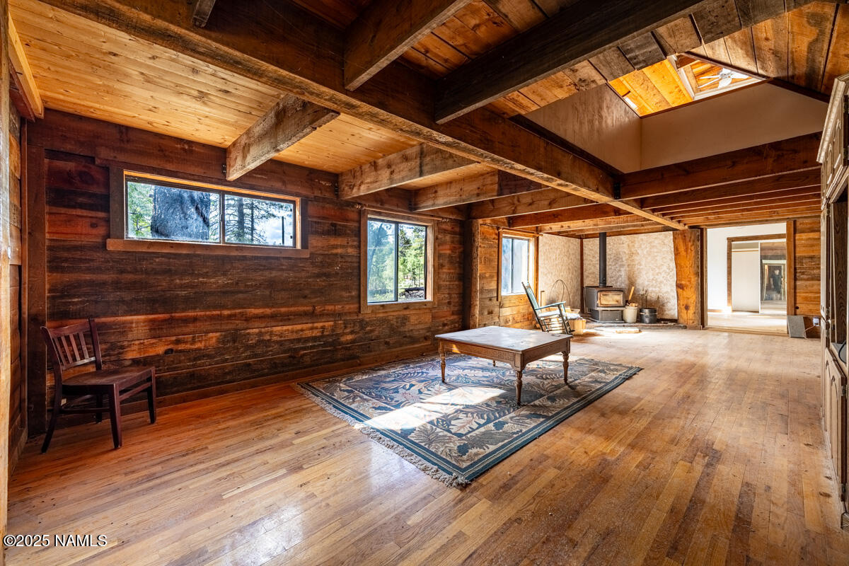 129 North Spitz Spring Road Parks, AZ 86018 - Photo 16 of 59 a living room with furniture a rug and a window
