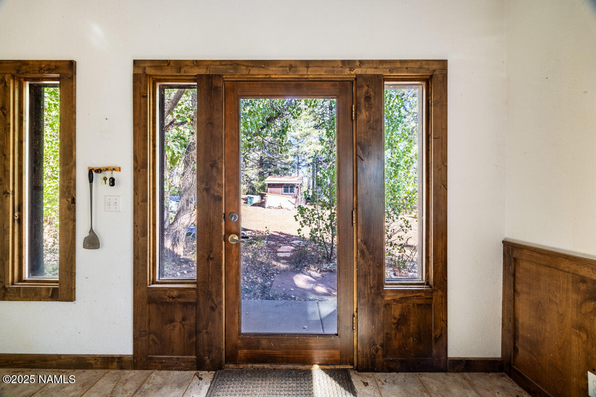 129 North Spitz Spring Road Parks, AZ 86018 - Photo 6 of 59 a view of a entryway door