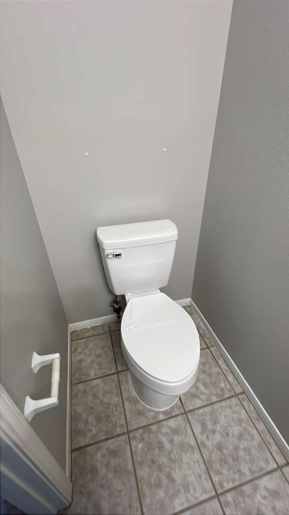 8617 Mapletwist Street Houston, TX 77083 - Photo 11 of 11 a bathroom with a toilet