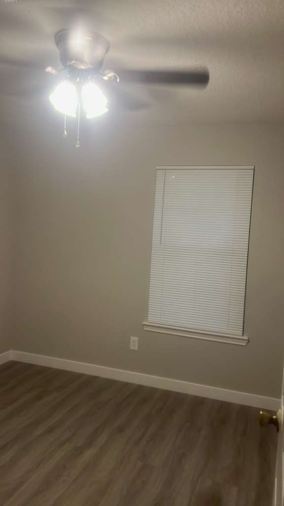8617 Mapletwist Street Houston, TX 77083 - Photo 2 of 11 a view of an empty room
