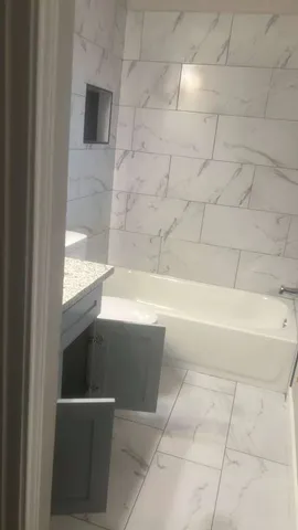 a bathroom with a bathtub