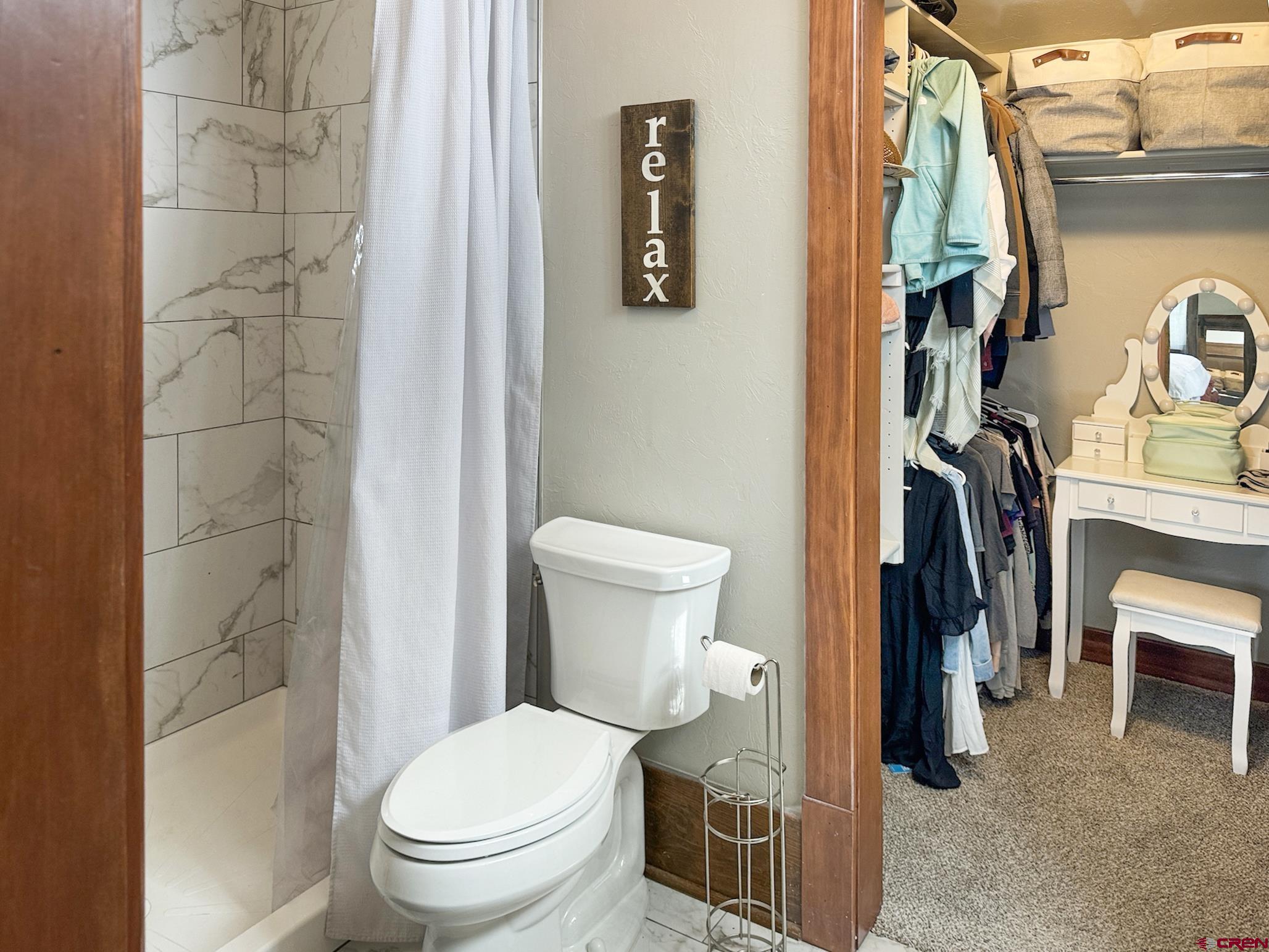 20570 Iris Road Austin, CO 81410 - Photo 13 of 35 a bathroom with a toilet and a sink