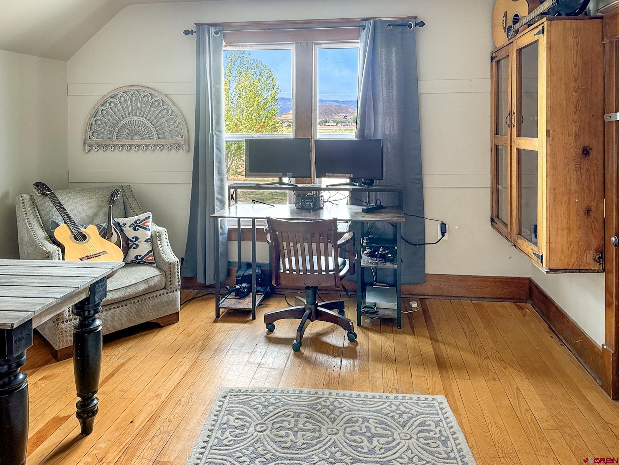20570 Iris Road Austin, CO 81410 - Photo 21 of 35 a living room with furniture and a table