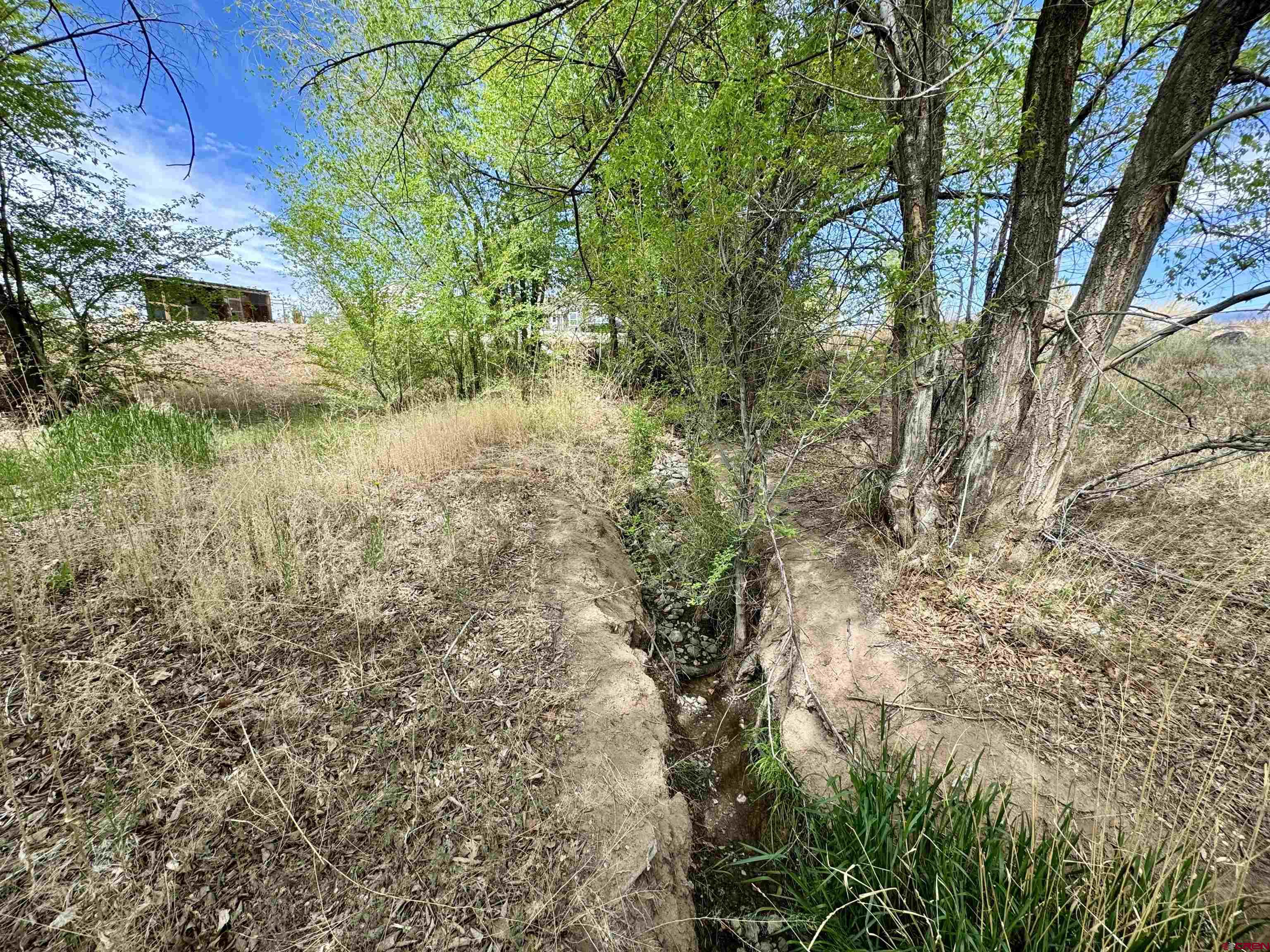 20570 Iris Road Austin, CO 81410 - Photo 29 of 35 a view of a lake with outdoor space