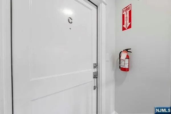 a bathroom with a shower and a window