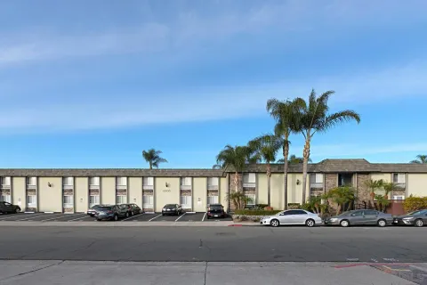 a front view of building with street view