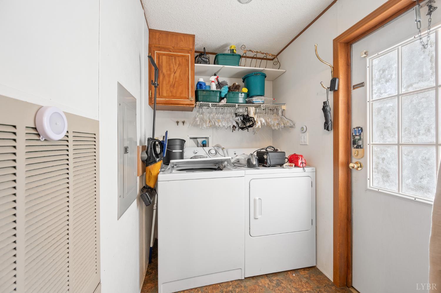 4400 Murray Hollow Road Thaxton, VA 24174 - Photo 29 of 56 a utility room with cabinets washer and dryer