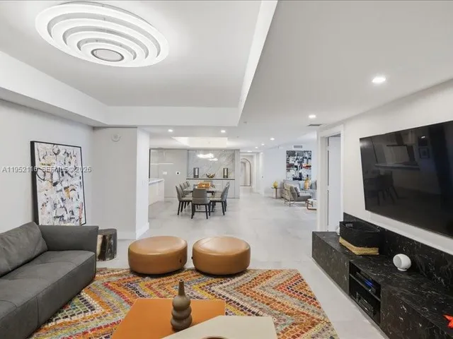 a view of a swimming pool with a lounge chairs