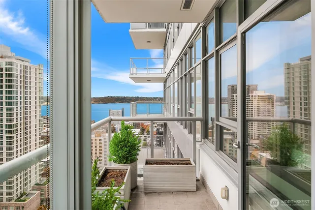 a view of a balcony with city view