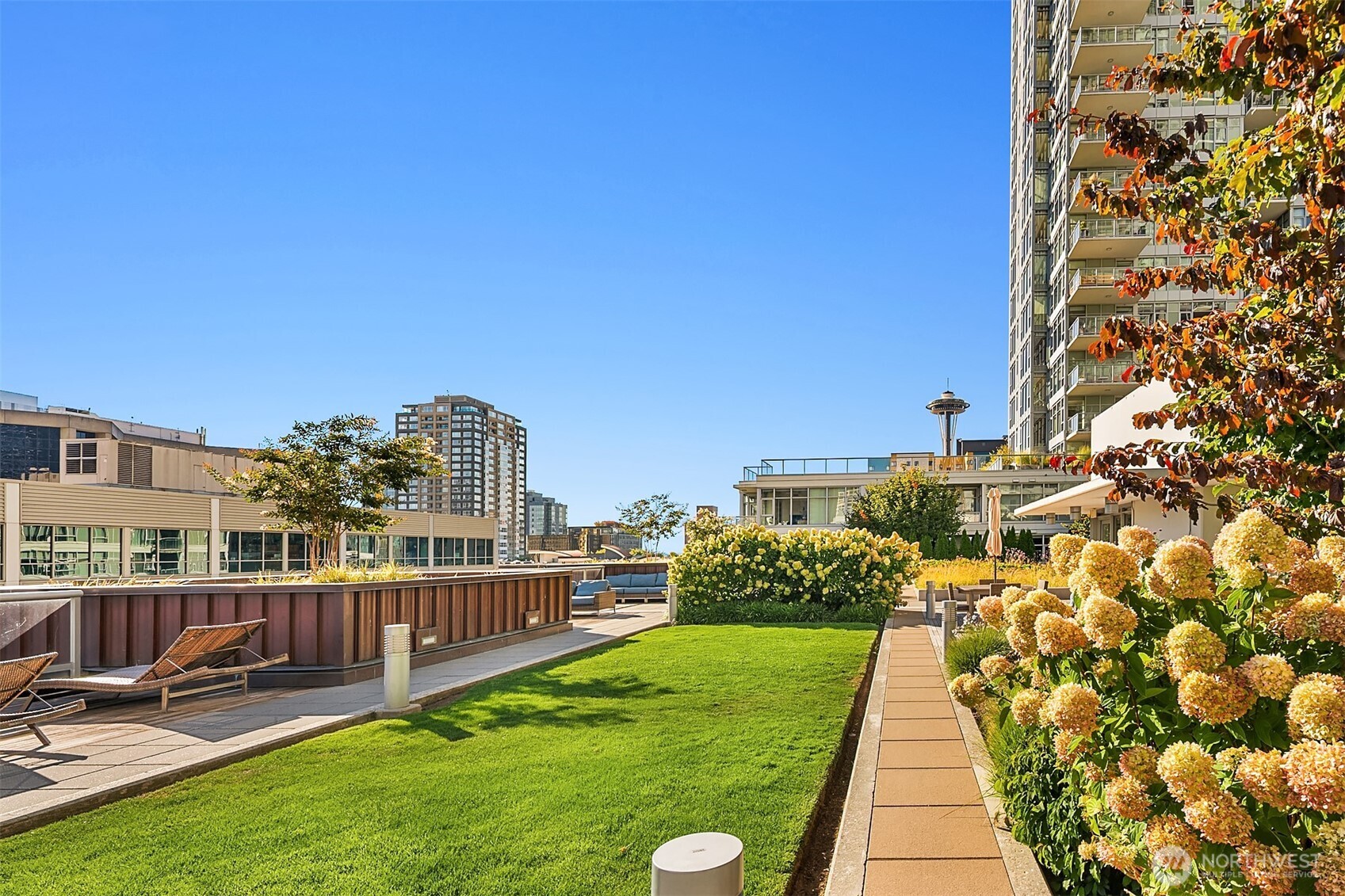 588 Bell Street, Unit 2405S Seattle, WA 98121 - Photo 13 of 34 a view of a balcony with chairs