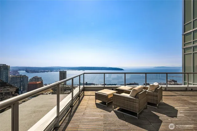 a view of balcony with furniture
