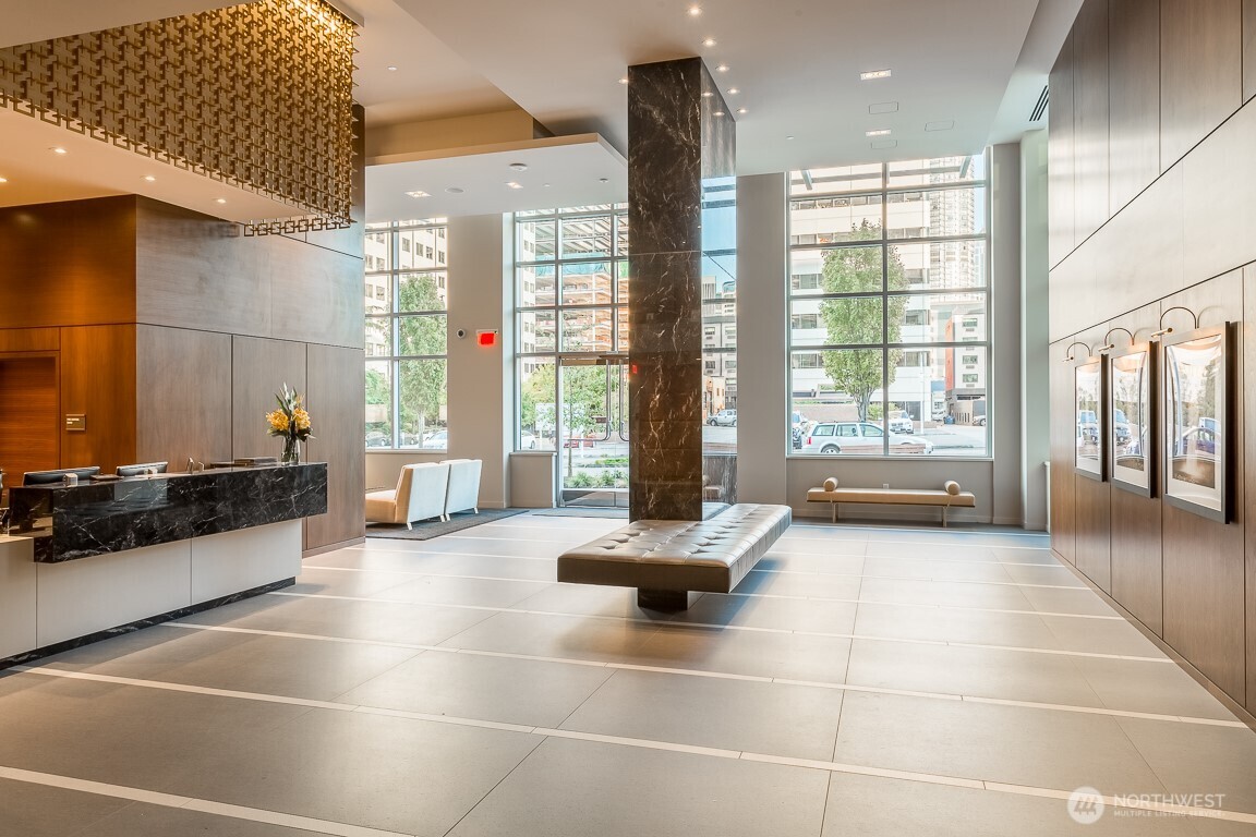 588 Bell Street, Unit 2405S Seattle, WA 98121 - Photo 28 of 34 a lobby with furniture and large windows
