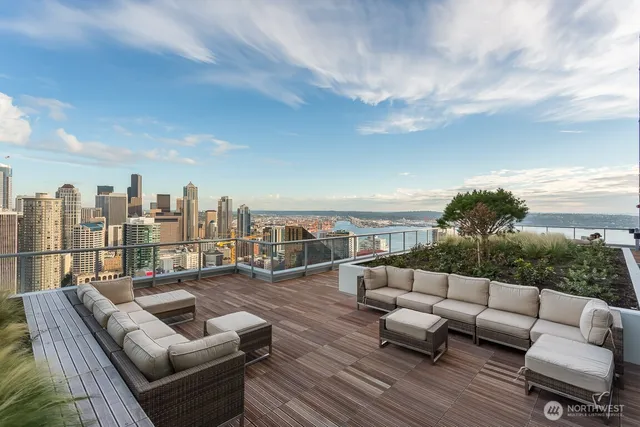 a terrace view with seating space barbeque oven and outdoor seating