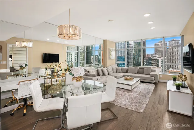a living room with fireplace furniture and a flat screen tv