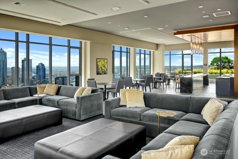 588 Bell Street, Unit 2405S Seattle, WA 98121 - Photo 32 of 34 a living room with furniture and a large window