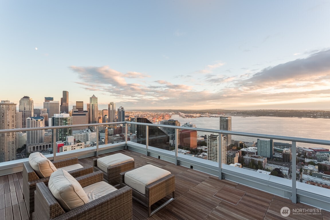588 Bell Street, Unit 2405S Seattle, WA 98121 - Photo 33 of 34 a view of a balcony with wooden benches