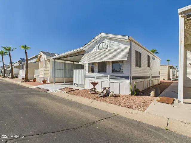 a front view of a house with a ocean view