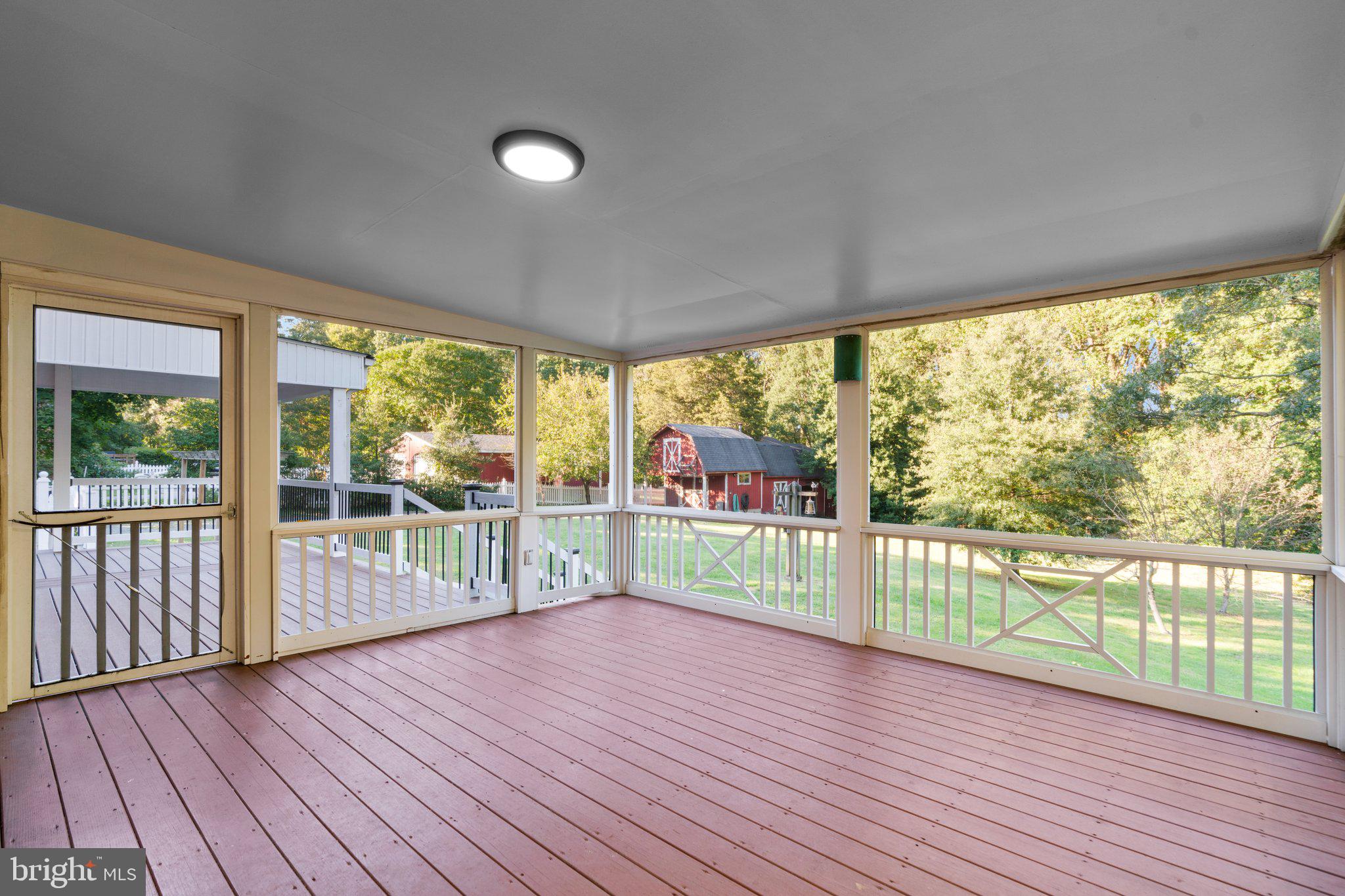 7908 Brooklyn Bridge Road Laurel, MD 20707 - Photo 40 of 55 LARGE SCREENED-IN REAR PORCH/DECK