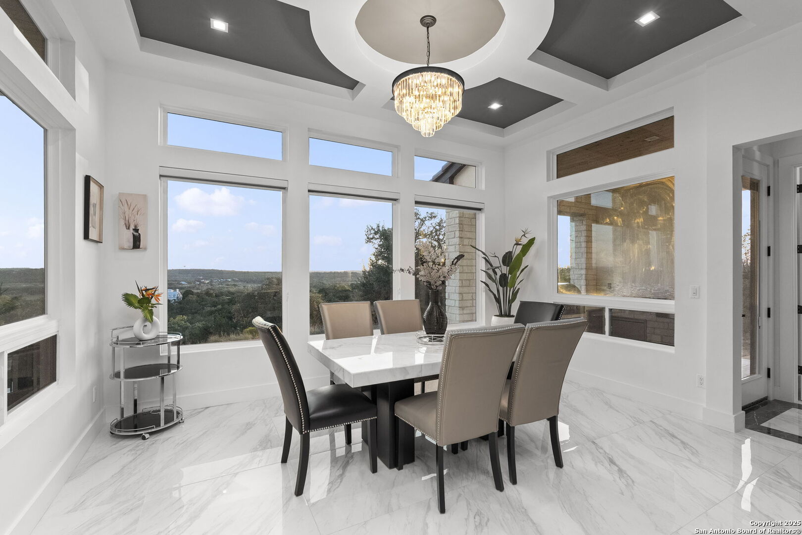 1178 Mystic Parkway Spring Branch, TX 78070 - Photo 11 of 62 a view of a dining room with furniture wooden floor and chandelier