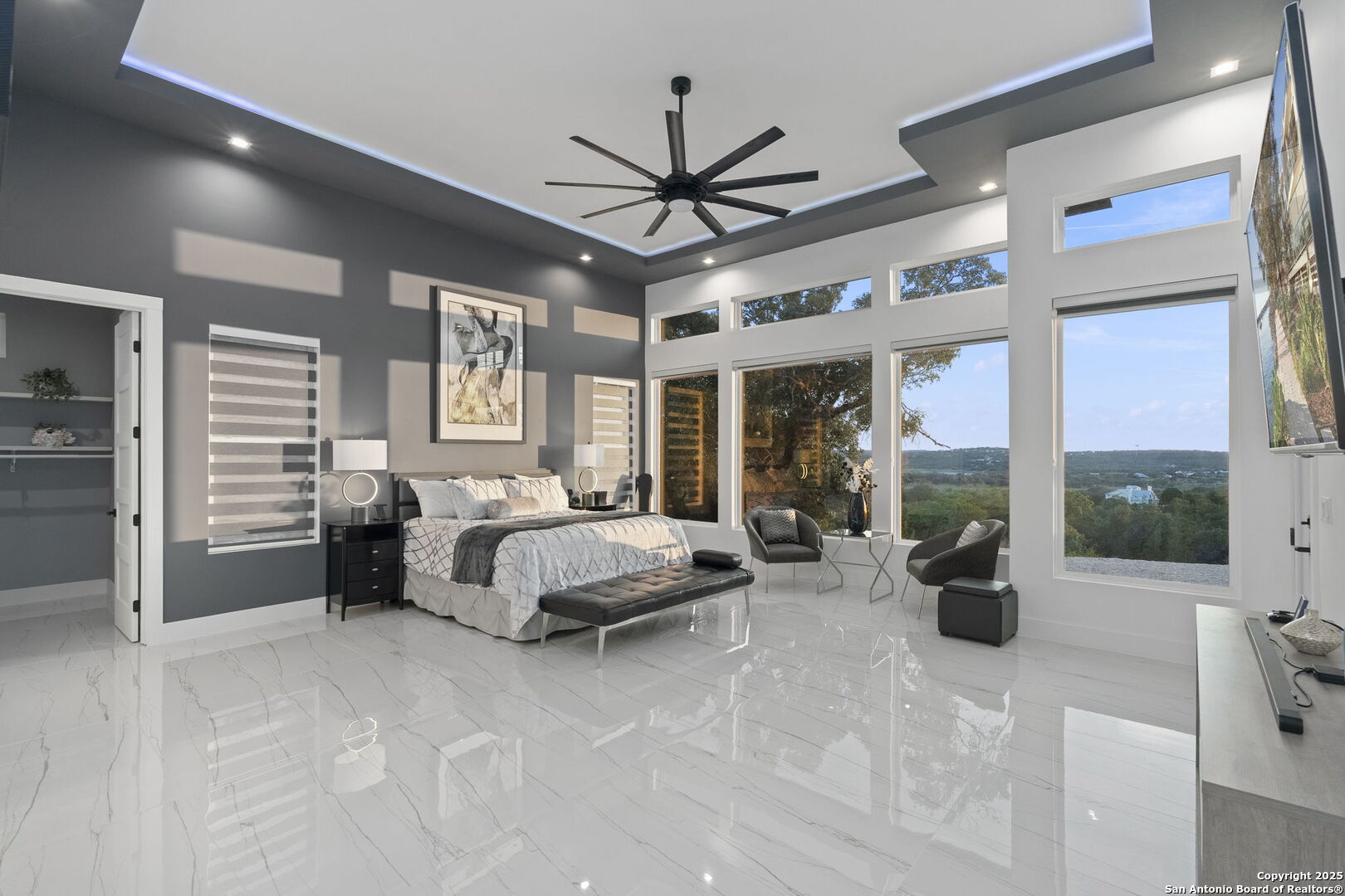 1178 Mystic Parkway Spring Branch, TX 78070 - Photo 17 of 62 a spacious bedroom with a large bed and a chandelier