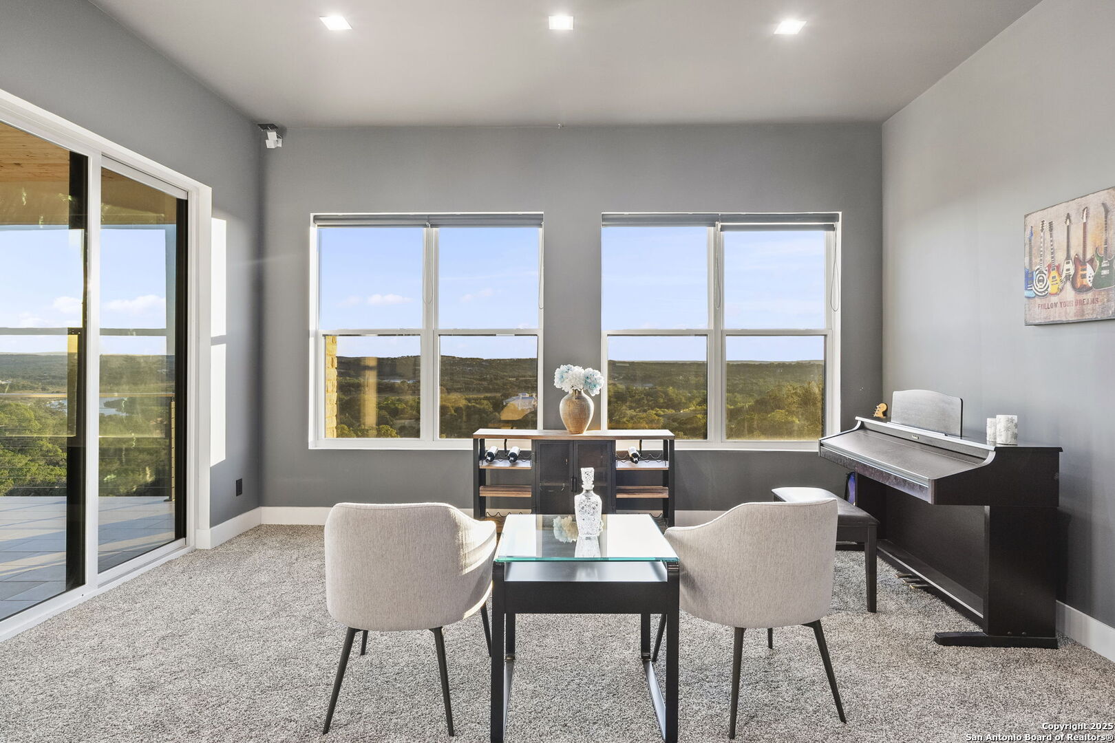 1178 Mystic Parkway Spring Branch, TX 78070 - Photo 36 of 62 a dining room with furniture a large window and a table