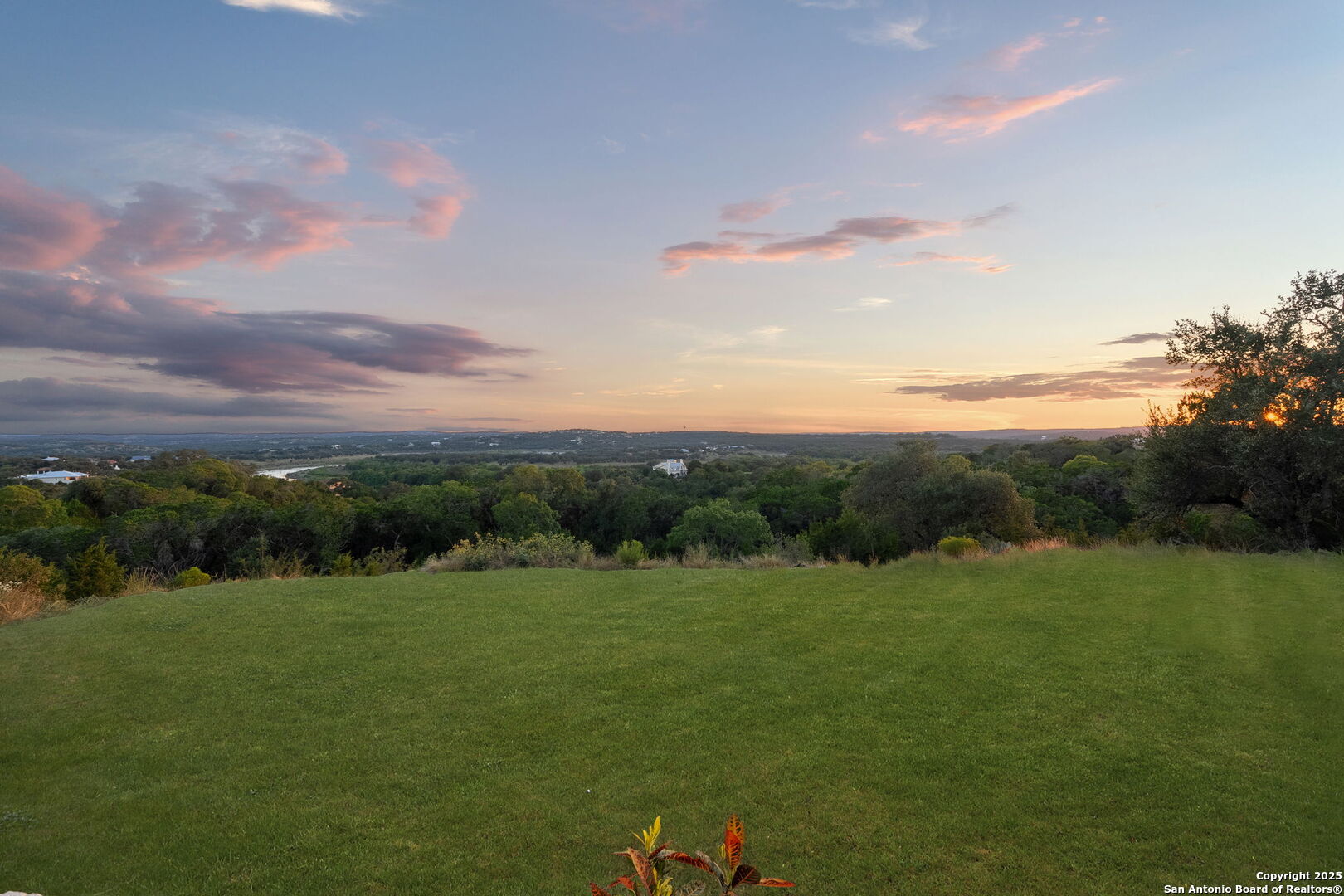 1178 Mystic Parkway Spring Branch, TX 78070 - Photo 45 of 62 a view of a grassy field with trees