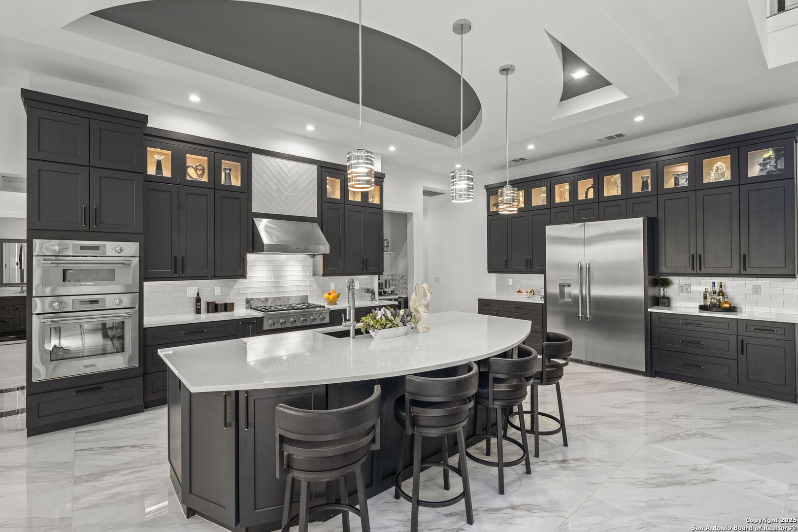 1178 Mystic Parkway Spring Branch, TX 78070 - Photo 6 of 62 a kitchen with stainless steel appliances kitchen island granite countertop a table chairs sink and cabinets