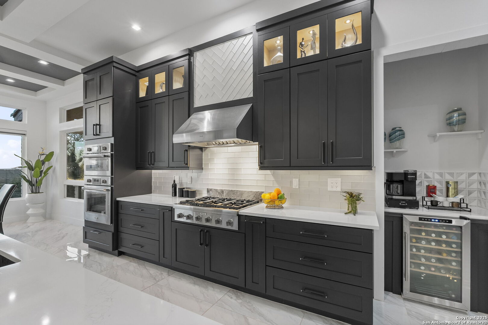 1178 Mystic Parkway Spring Branch, TX 78070 - Photo 7 of 62 a kitchen with stainless steel appliances a stove a sink and cabinets