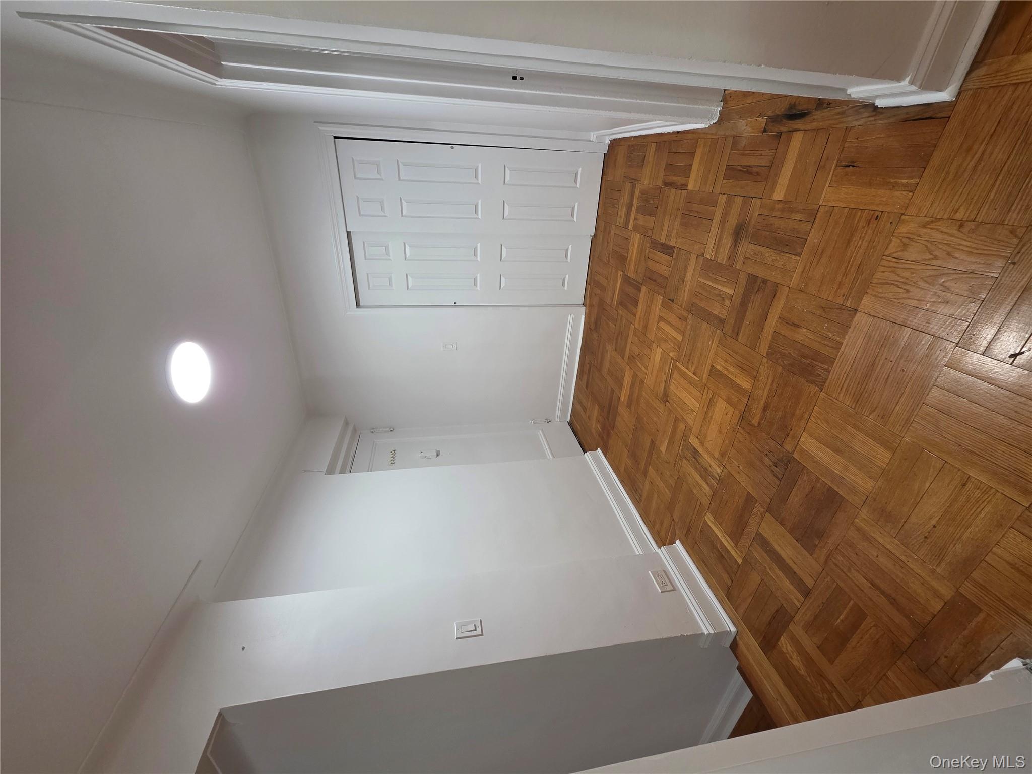 98-50 67th Avenue, Unit 1H Queens, NY 11374 - Photo 3 of 15 a view of empty room