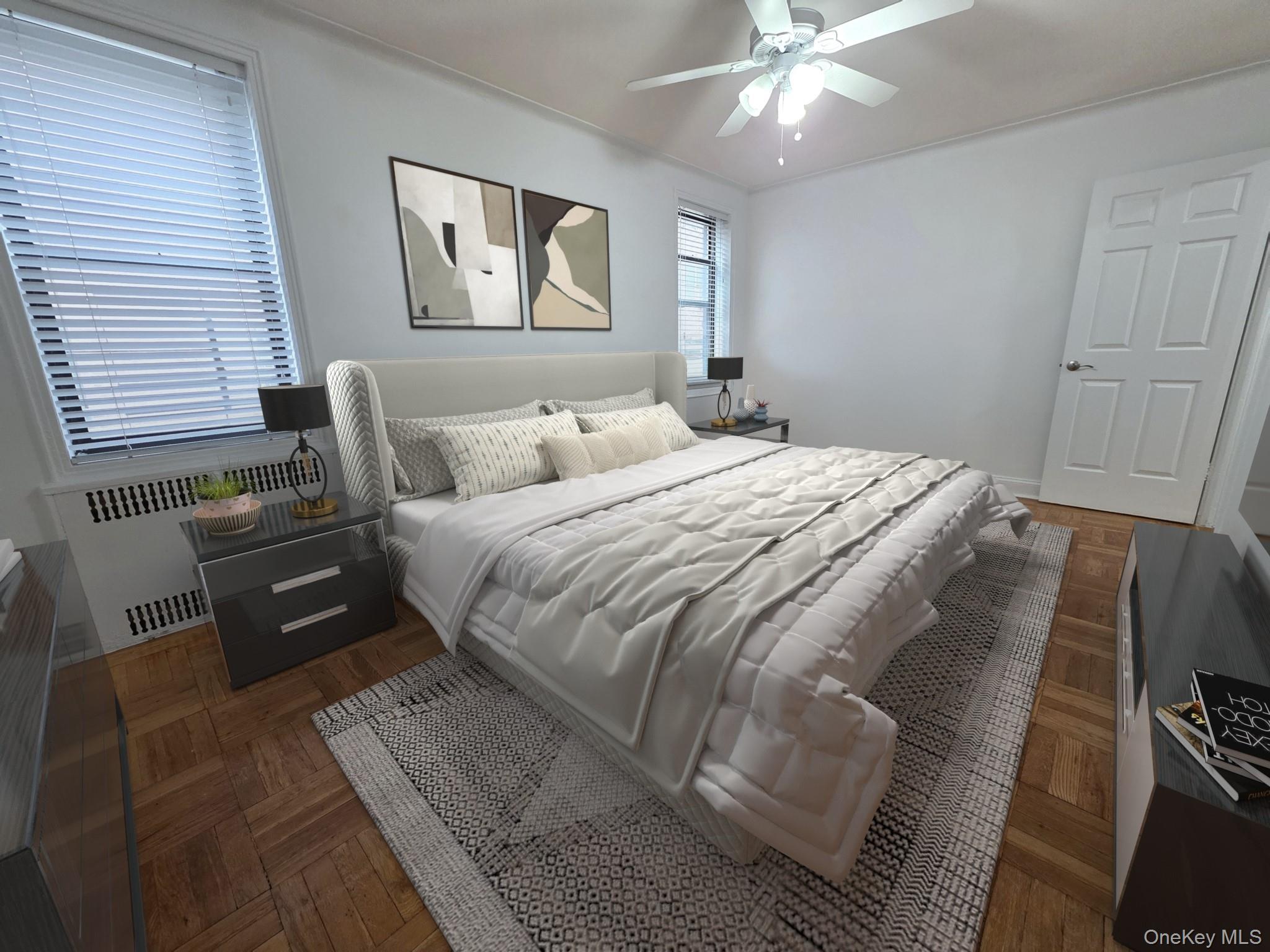 98-50 67th Avenue, Unit 1H Queens, NY 11374 - Photo 9 of 15 a bedroom with a bed and wooden floor