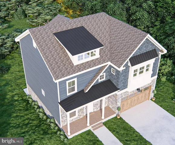 a aerial view of a house with a yard