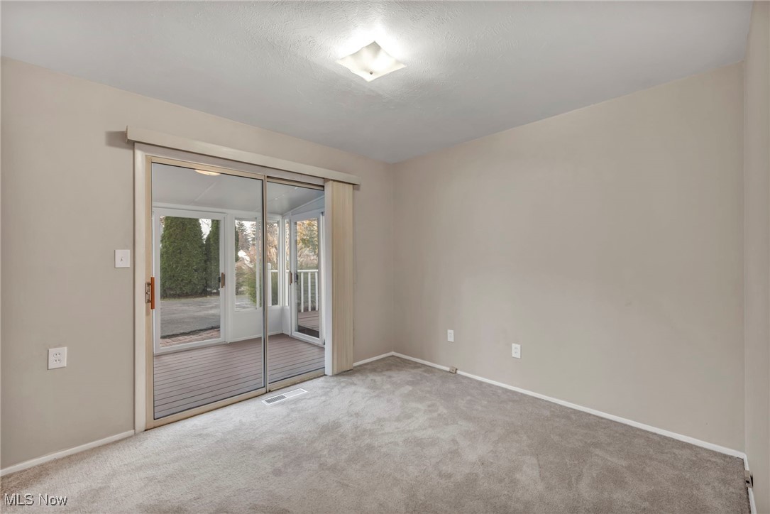 267 Barrett Road Berea, OH 44017 - Photo 28 of 41 View of carpeted empty room