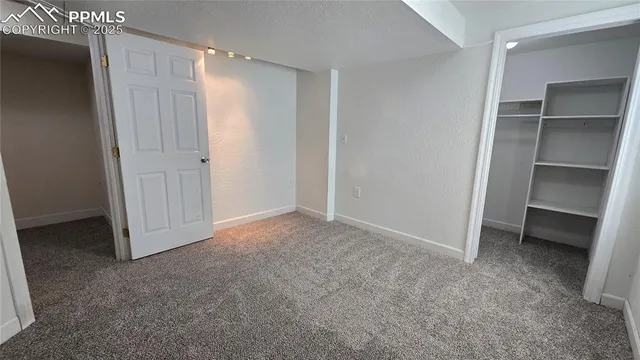 a front view of a house with garage